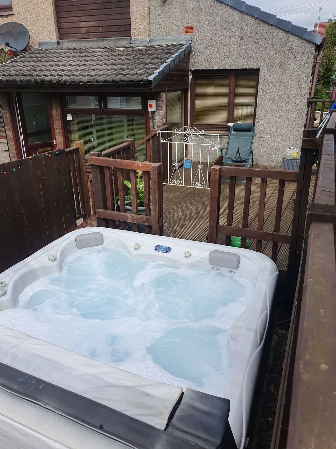 The private hot tub on the cabin decking